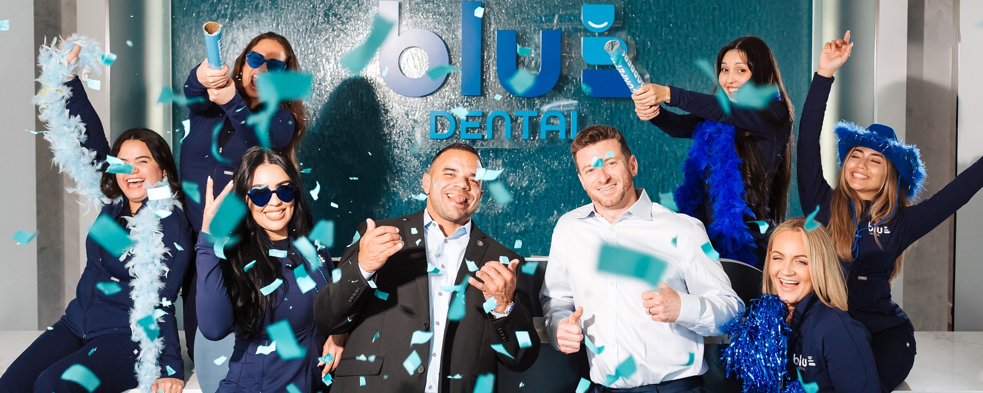 Blu Dental team of dental professionals members are having fun and smiling