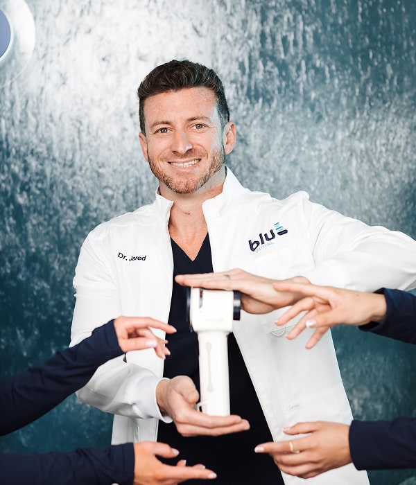Smarter, Faster Dental Visits with High-Tech Tools. Dr. Jared is smiling and presenting dental technology