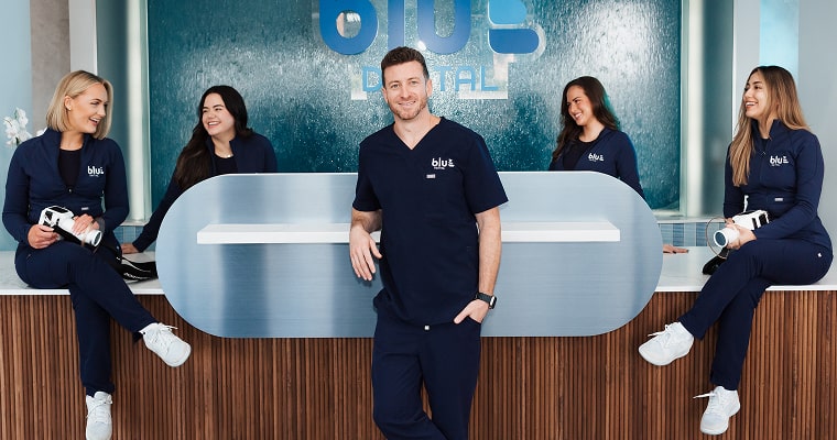 Blu Dental team and Dr. Jared posing for a photo