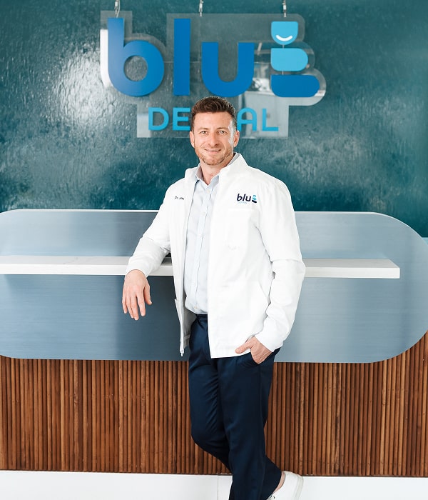Reliable Tooth Repair and Pain Relief When You Need It Most. Dr. Jared is happily smiling at front desk